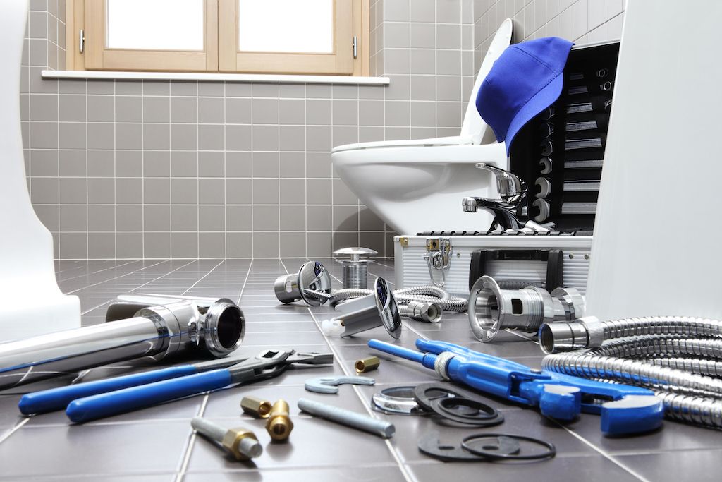 Plumber Tools And Equipment In A Bathroom, Plumbing Repair Service, Assemble And Install Concept